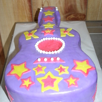 Hanna Montana B-Day For a 6 year old that loves Hanna Montana we call her KK that is why it is on the guitar