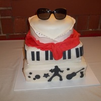 Elvis all fondant and gum paste. the glasses are real