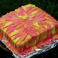 Fire Flower This is a white cake with lemon filling covered with a coat of buttercream and covered with marshamllow fondant. The fondant is cut out...