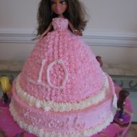 Doll Cake I was asked to make a doll cake for a 10 year old. I made the doll cake and 20 mini cakes for her guest. Butter cakes and buttercream....