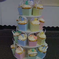 Baby Shower Cupcake Tower Vanilla cupcakes with cheescake, strawberry and lemon meringue fillings with buttercream frosting. I found these cute little boxes at the...