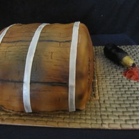 Barrel Cake Was a red velvet cake with fondant which was air brushed.