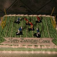 Football Cake Chocolate cake with hazenut buttercream filling.