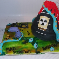 Mad Scientist This cake was for a Mad scientist themed party. All cake with Fondant accents.