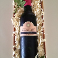 Wine Bottle Cake My first try at a gum paste wine bottle and thanks to the tutorial owner on Facebook. It was so easy to follow. Bottle and leaves are gum...