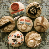 Pen Pal Challenge Made from fondant and sugarclay.Handpainted the lettering & dusted the cupcake surface to get that antiqued scrapbook look.