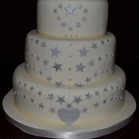 Stars Wedding Cake This was a request for a wedding cake with a star theme because the bride, groom and their son's initials together make the word star...