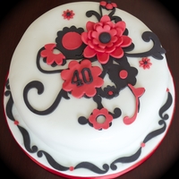 Lizzie's 40Th Birthday Cake Black & red birthday cake inspired by the recipients black curly hair and her love of bright red lipstick.