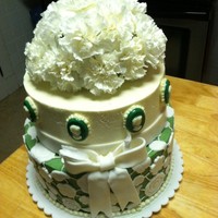 Lace And Cameo Anniversary I made this cake for my parents 40th Anniversary. Its frosted in vanilla cream and has mmf accents. The cameos are chocolate and the...