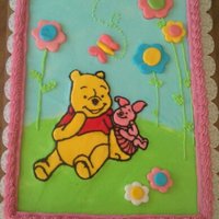 Winnie The Pooh Winnie the Pooh baby shower cake made with BC and MMF decorations.