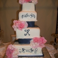 Dani & Lyle's Wedding Cake made for my niece & her hubby - 1st & 4th layer is WASC vanilla w/ amaretto filling & white chocolate ganache; 2nd layer...