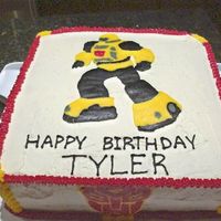 Transformers - Bumblebee This cake was done for a Transformer fanatic. Bumblebee & the Transformer logo were FBCT's. One chocolate layer & one vanilla...