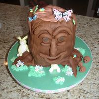 Tree Stump Cake Made this for my daughter's brownie/daisy bridging ceremony. Strawberry lemonade cake with strawberry buttercream. Covered in fondant...