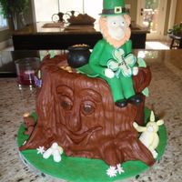Irish Themed Birthday Cake Based on Debbie Brown's design. WASC cake with cookie dough filling. Leprechaun face is made from modelling chocolate (my new favorite...