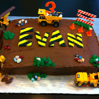 Construction Cake Construction cake for boy's 3rd birthday including a dump truck, bulldozer, power roller, payloader, backhoe, safety cones, edible...