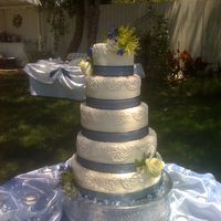 5 Tier Cornelli I was sooo happy at how straight this cake was. I got to do the flowers myself... the florist left me the leftovers to do with what I...