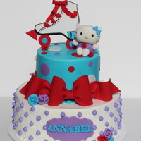 Hello Kitty At The Roller Rink Buttercream cakes with fondant detail and toppers. TFL!