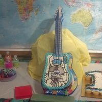 Guitar I made the cake stand and and cake to look like one piece for my grandsons' birthday. It was the highlight of his day.