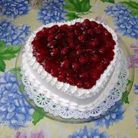 A Mother's Heart Red Velvet cake w/ cherry and cream filling. Decorated with whipped cream and cherries.TFL
