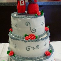 Brutus And Mrs Brutus Buckeye Wedding Made this cake for a wedding vow renewal ceremony. Couple are huge Buckeye fans. Couple wanted Brutus and Mrs Buckeye on top of their cake...