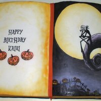 Kairi's Nightmare Before Christmas Book Cake I used Wilton's 11 x 15 book cake pan. I forget what flavor the cake was lol. BC icing with RBC sides. The pages were done with...