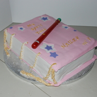 Wizard Spell Book Cake This was for my Daughters 7th birthday. She was having a Wizards of Waverly Place theme. I found out why book cakes are so hard!TFL