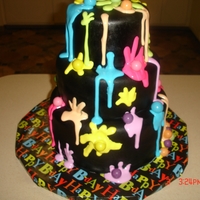 Paint Ball Cake White cake with color splat inside as well inside top 2 tiers...bottom tier chocolate