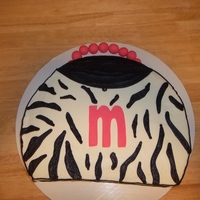 Zebra Purse Cake All buttercream accept for the letter and the handle is fondant. Thanks for looking!