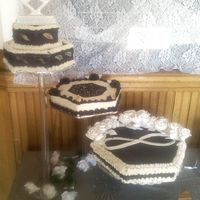 Anniversary/vow Renewal Cake I did this for a friend's vow renewal. The bottom cake is spice cake with cream cheese frosting and a cream cheese/whipped cream...