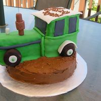 Tractor Cake the tractor is covered in fondant.