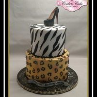 Buttercream Cheetah Print And Zebra In Buttercream With Fondant Stripes Buttercream Cheetah print and zebra in buttercream with fondant stripes