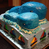 Mom And Baby Whale Photo SMBC with fondant sailboat decorations. Rectangular cake made of chocolate cake with cookies and cream filling Mommy whale: vanilla...
