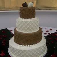 Coreyandmichelle chocolate and vanilla cake with chocolate covered strawberries and royal icing scrolls and pearls.