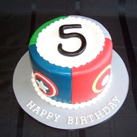 Avenger's Birthday Cake 6" round cake with logo's for Captain American, Iron Man, Hulk, and Thor. This went with 4 dozen cupcakes.
