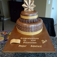 Air Force Maj. Promotion Made this cake for my husband's promotion. Chocolate cake covered in chocolate MMF. Gumpaste rank.