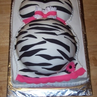 Baby Bump Cake 1/2 sheet with baby bump on top. fondant iced