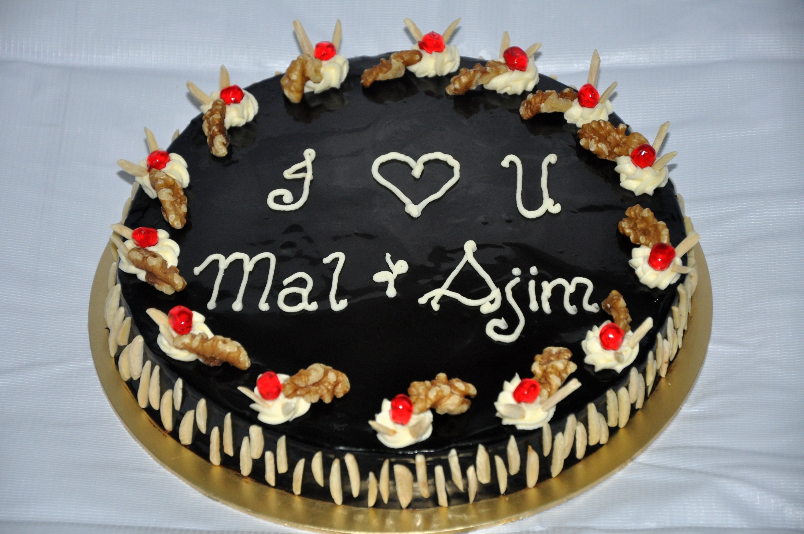 Chocolate Cake With Chocolate Ganache, Walnuts And Almond. Thank You =) 