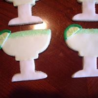 Margaritas Margarita cookies! Lemon cookies w/ RI and fondant (for the stem of the glass)- fondant lime wedges- thanks for looking!
