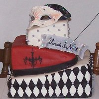 Masquerade Prom 6/9/12 square topsy turvy. Covered in fondant, all decorations are mmf. This was a really fun cake to make!!