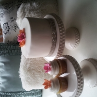 Bridal Shower Cupcake Tower Made 60 cupcakes and a 6 inch topper cake for a cupcake tower for a Bridal Shower.