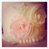 Ruffled Flowers Birthday Cake 6 inch tall buttercream birthday cake I made for myself. Ruffled flowers and leaves are fondant.