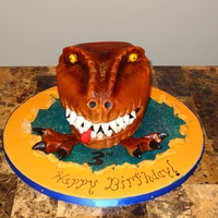 Dinosaur Head 1st cake i've done in over 2years. went better than I expected....not as bad as it could have...lol