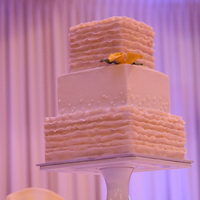 Ruffled Square Wedding Cake My client came to our consultation with one, yes ONE, computer printed image in her hand. This is the cake she wanted. And I was very happy...