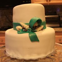 Beach Themed Engagement Cake Beach themed engagement cake for friend Nichol. Teal knot tied around center to coordinate with her wedding colors.