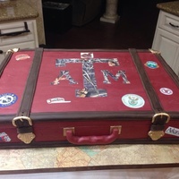 Suitcase Grooms Cake Strawberry cake w/ bc icing, covered in modeling chocolate and edible images of all the places the groom has traveled and plans to travel...