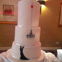 Black & White Wedding Cake 7 tier wedding cake - made to look like 3 tiersSponge cake with butter icingOver 2 feet tall.