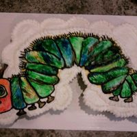 Hungry Caterpillar Cupcake Cake White and Chocolate Cupcakes with Hungry Caterpillar Buttercream Transfer handpainted with gel food coloring