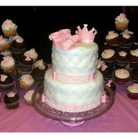 Princess Baby Shower Cake 6 inch and 8 inch cake, covered in MMF, diamond pattern, ediblie balls topped with fondant sandals and crown, and cupcakes with fondant...