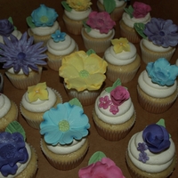 Flower Cupcakes Fantasy Flower cupcakes made to match colors for a Bridal shower.