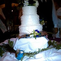 Peacock Wedding white cake with buttercream icing and white design work